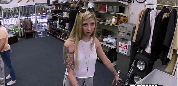  Inked chick bounces on a big dick for some money in pawnshop